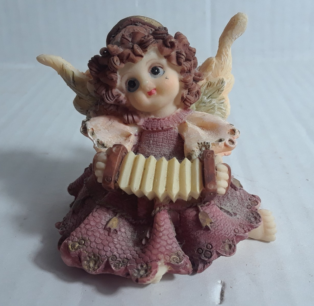 Vintage Small Setting Angel Figurine 3.25 in Playing Harmonica