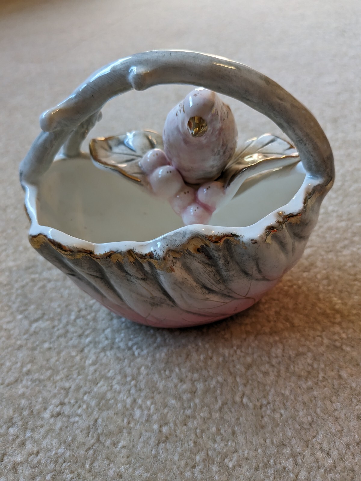 vintage UCAGCO ceramic bird sitting on berries and basket with handle