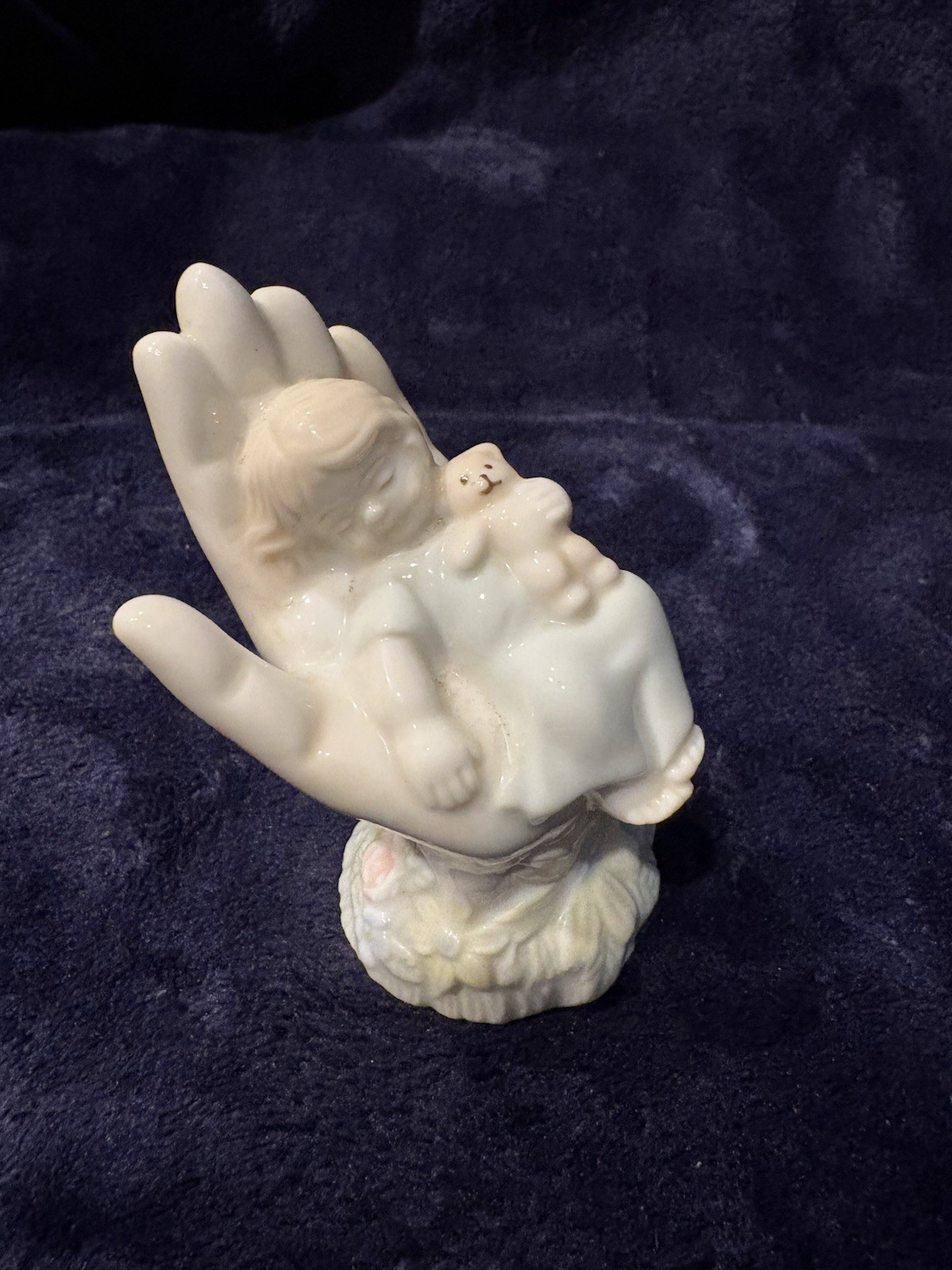 vintage porcelain “In God’s Hand” figurine, part of the Valencia Collection.