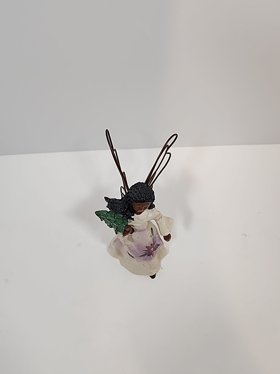 African American Angel Figurine With Metal Wings Holding A Christmas Tree