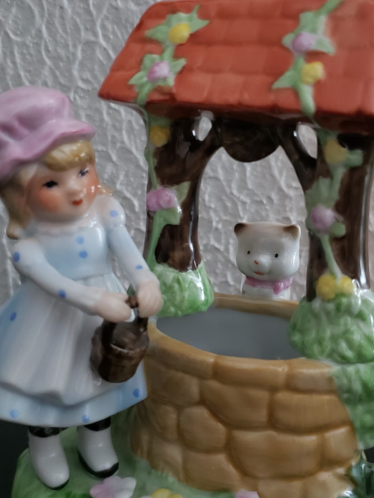 Vintage girl with cat at wishing well hand painted figurine made in Korea