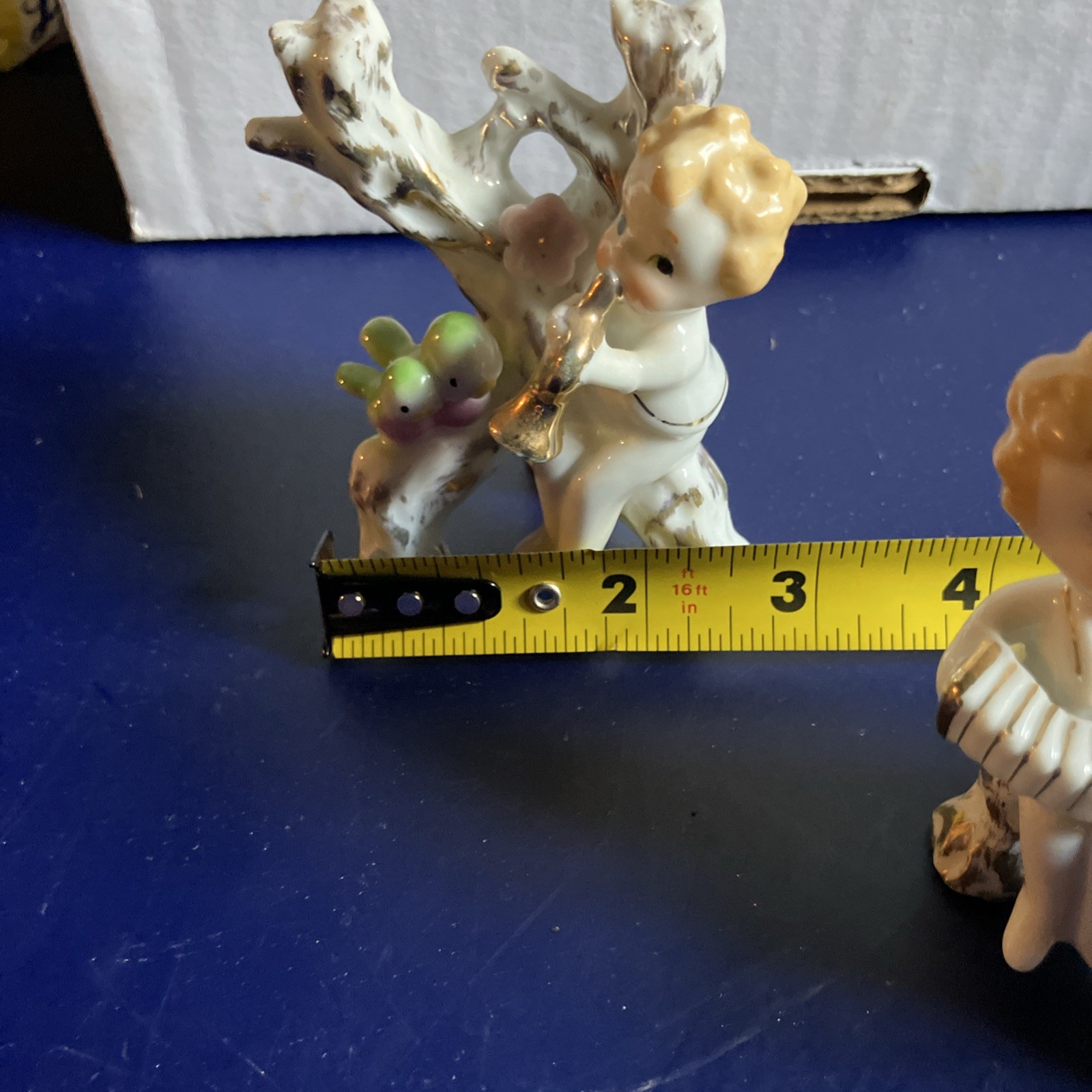 Two Vintage Cherubs Playing Instruments