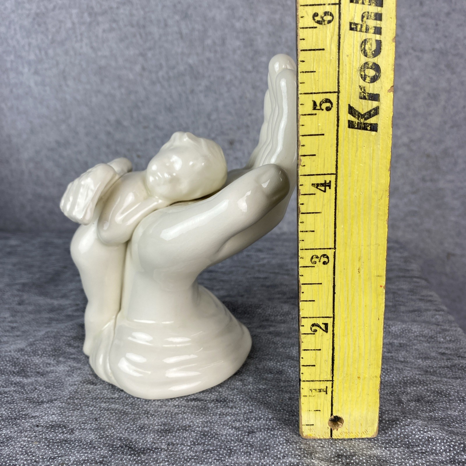 Ceramic Sleeping Cherub On The Hand of God Angel White Shiny Glaze