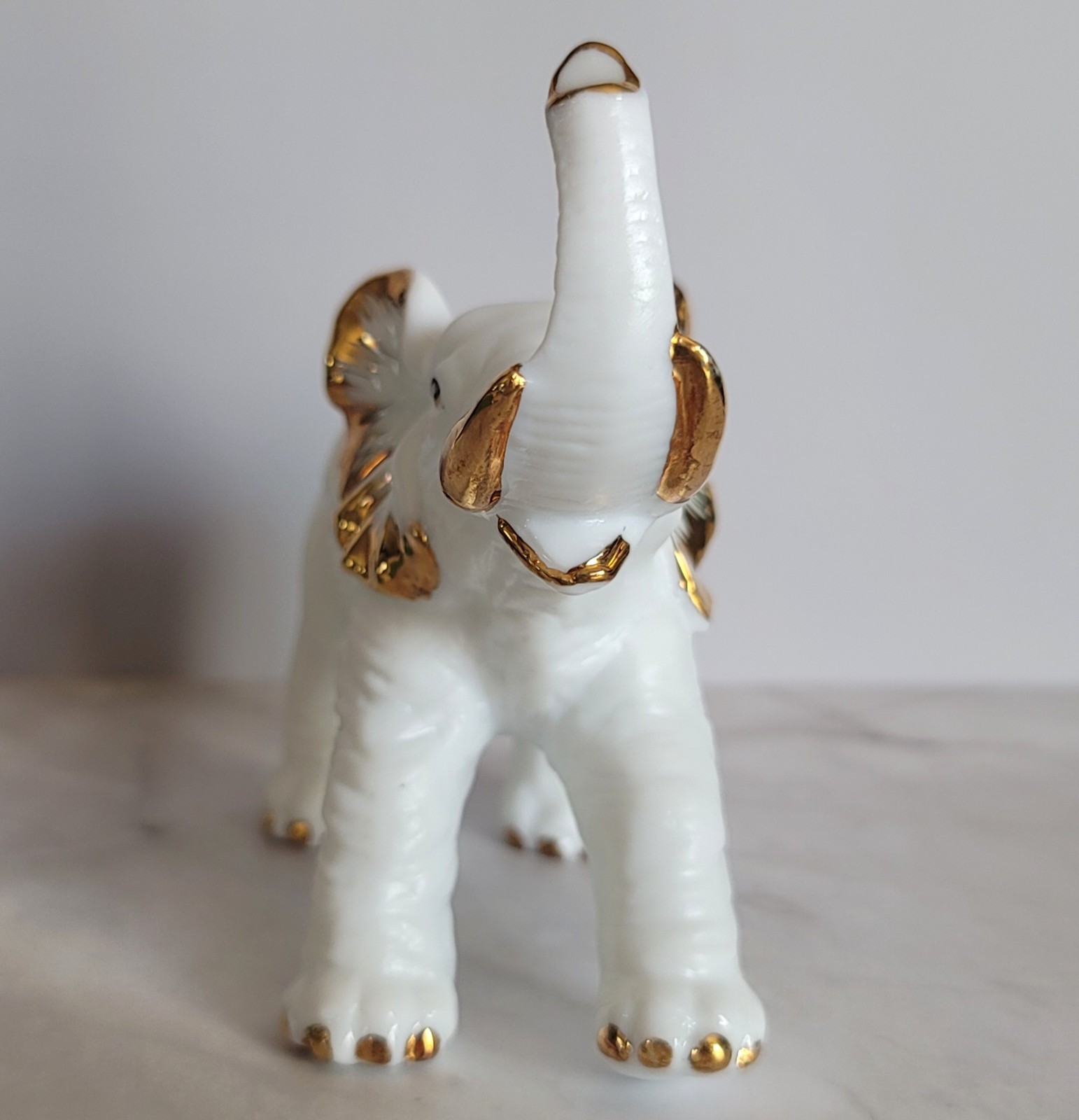 Vintage Matte & Glossy White Elephant Figurine w/ Gold Trim 4-1/2″ Tall 5″ Long