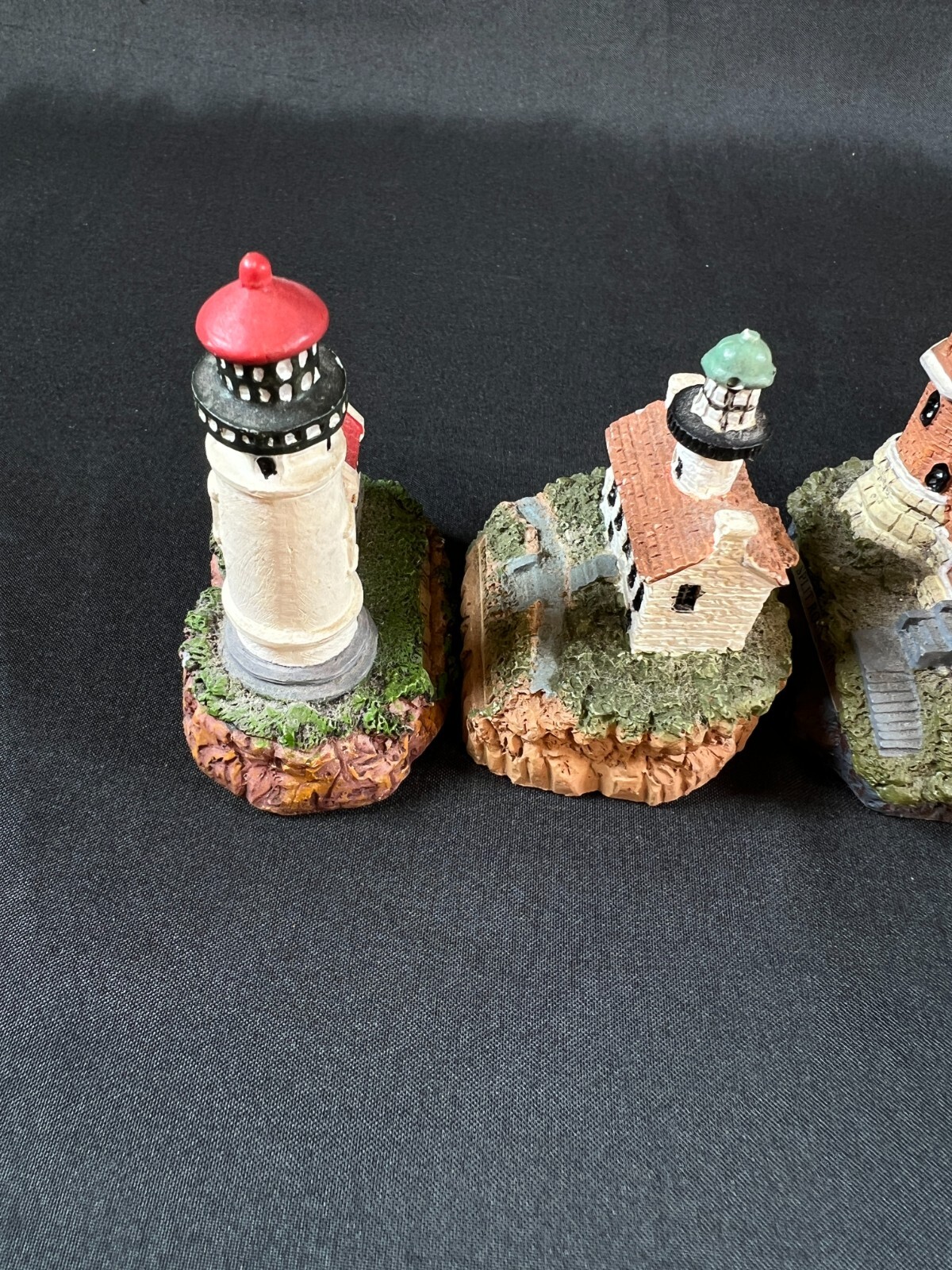 4 collectible vintage lighthouse/house statues 2.25” X 3.0” small decor