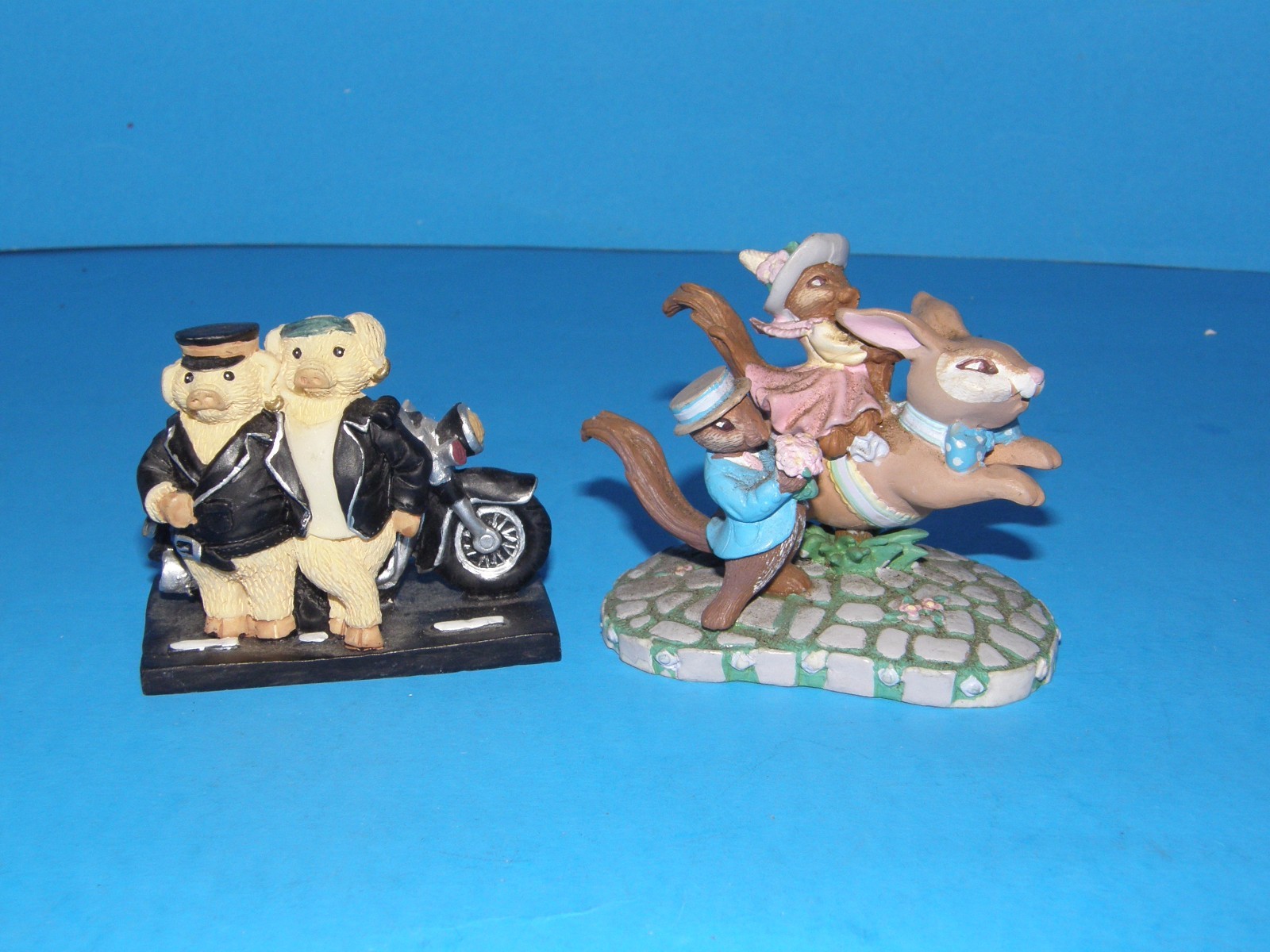 1993 AVON KATHY JEFFERS CAROUSEL COLLECTION, BUNNY RABBIT & 2 PIGS ON MOTORCYCLE