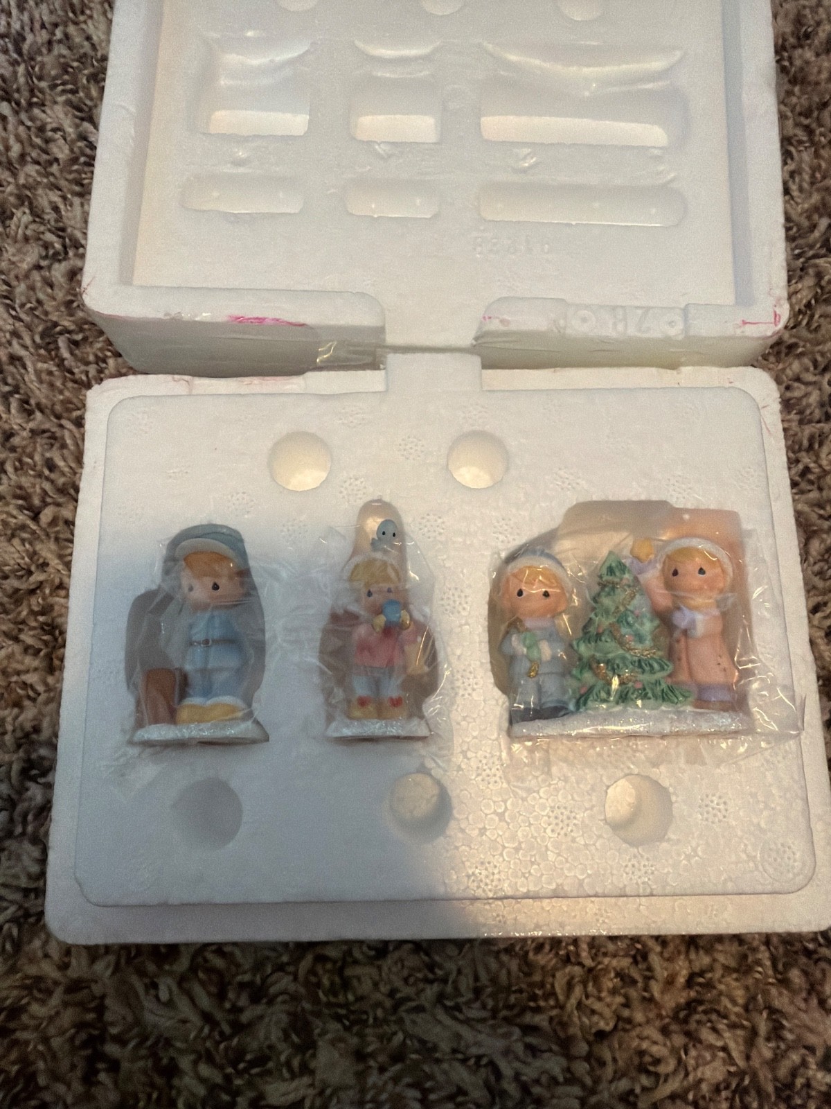precious moments christmas village figurines