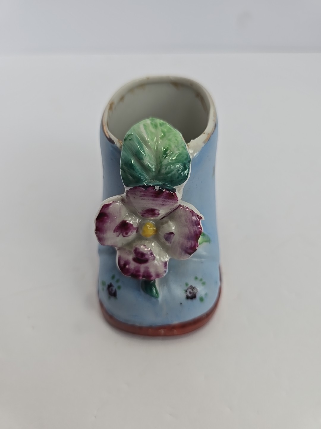 Porcelain Blue Baby Shoe with Capodimonte Style Purple Flower and Green Leaves