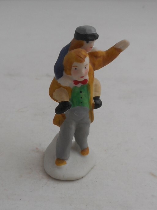 Porcelain Figurine Village Man carrying Boy Waving in snow 2 3/8″ H x 1″ Wide