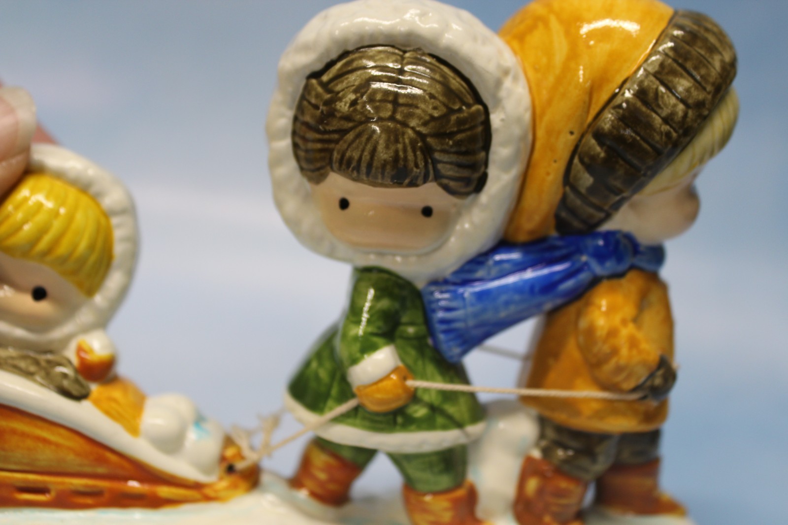 Joan Walsh Anglund. Vtg 1972 Ceramic Figurine children sledding made in Japan.