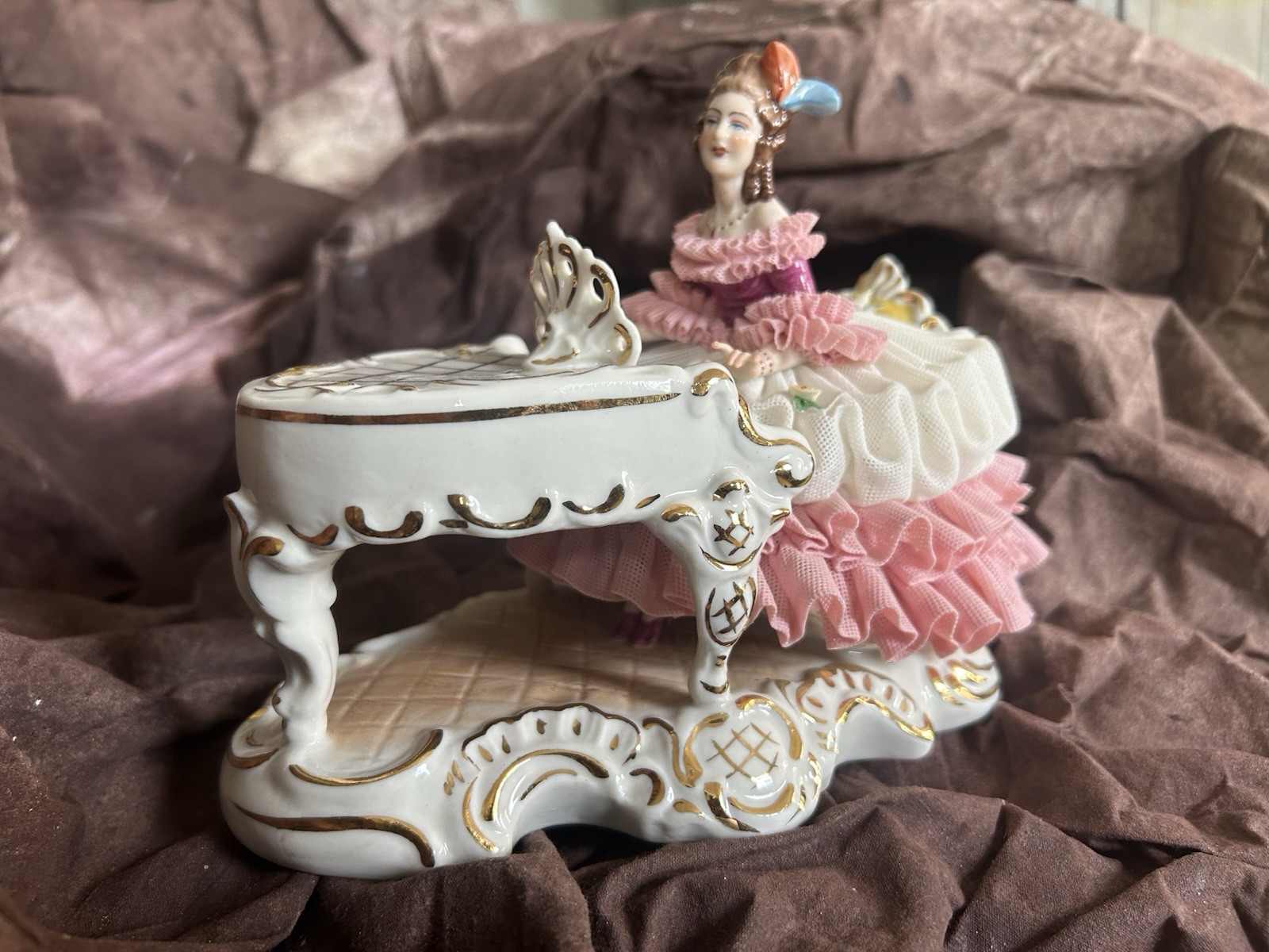 German Porcelain Dresden Lady at Piano. Dipped Pink/White Dress Numbered piece.