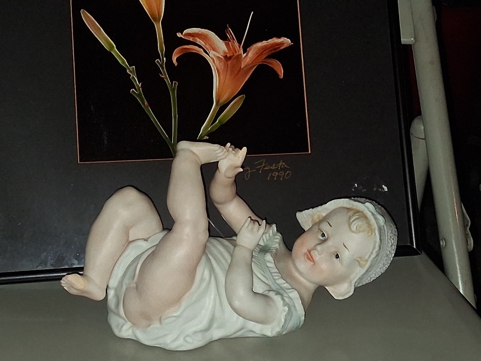 Gebruder Heubach-German Porcelain Bisque-Lying On Back Piano Baby–11″ Length