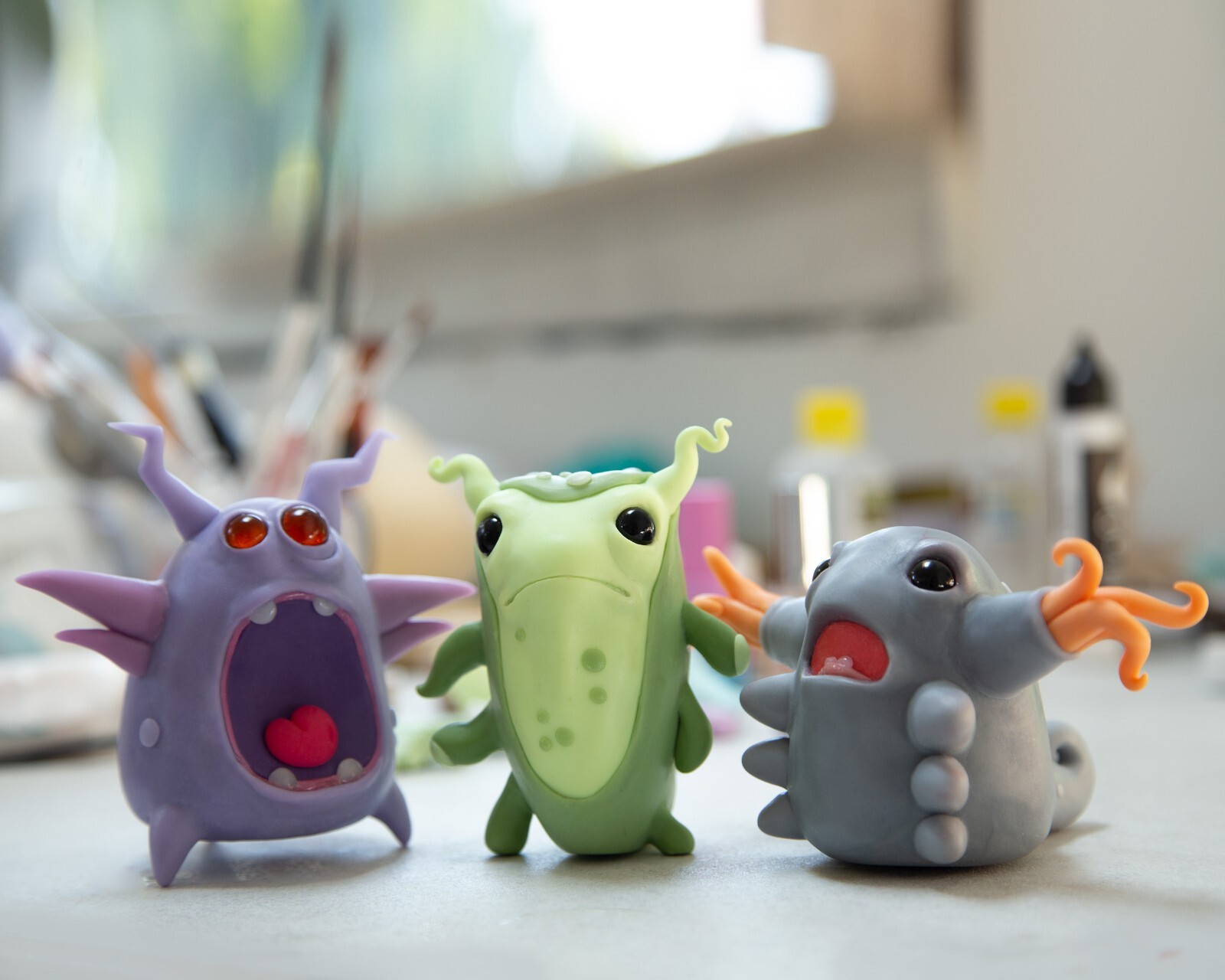 Cool and weird Germ Microbe figurine in anime style, polymer clay creature doll