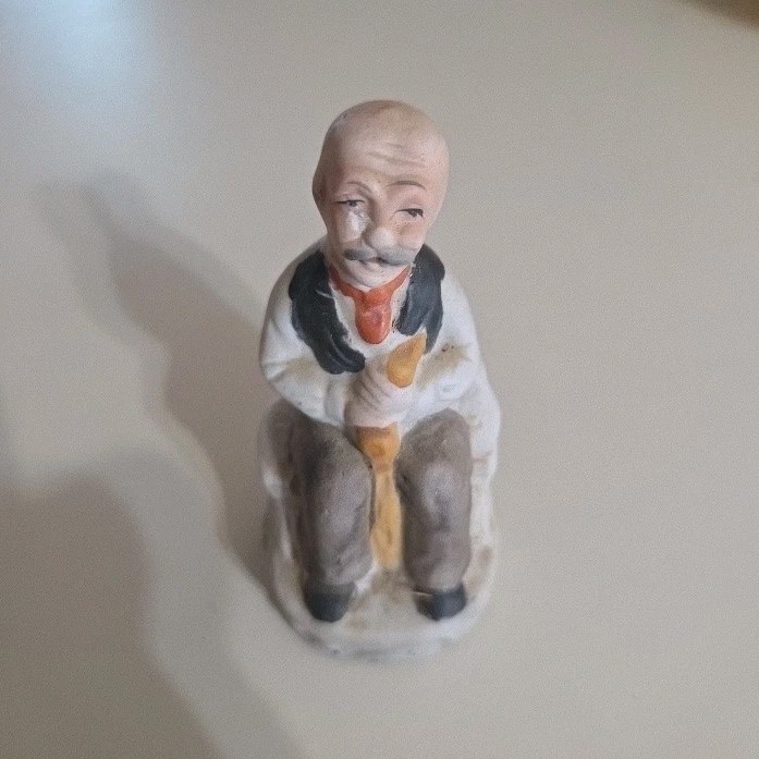 Seated Man Painted Ceramic Figurine Small White Brown Black Orange