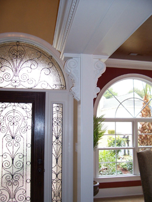 A grand entrance! These corbels (item PN476) frame an archway inside an entrance in a private residence in the USA. Mounted and capped and then painted white, they make a fantastic feature in a grand home.